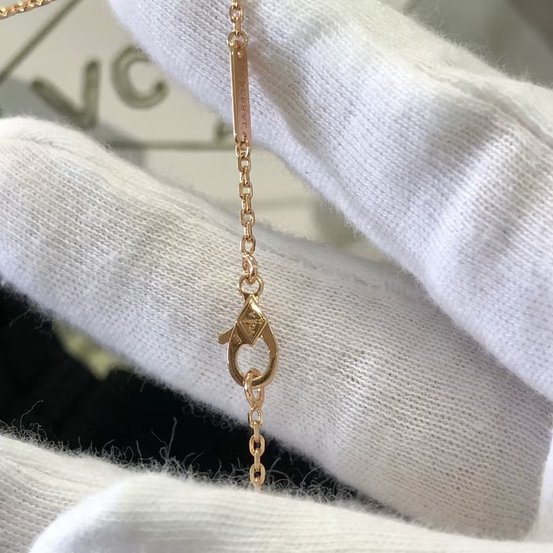 Buy replica Van Cleef & Arpels Rhodonite Vintage Alhambra Diamond 2021 Holiday Pendant Necklace and replica jewelry from PICKS Jewelry