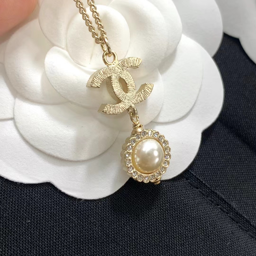 Buy replica Chanel Minimalist Double C Pearl Drop Necklace and replica jewelry from PICKS Jewelry