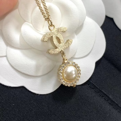 Buy replica Chanel Minimalist Double C Pearl Drop Necklace and replica jewelry from PICKS Jewelry