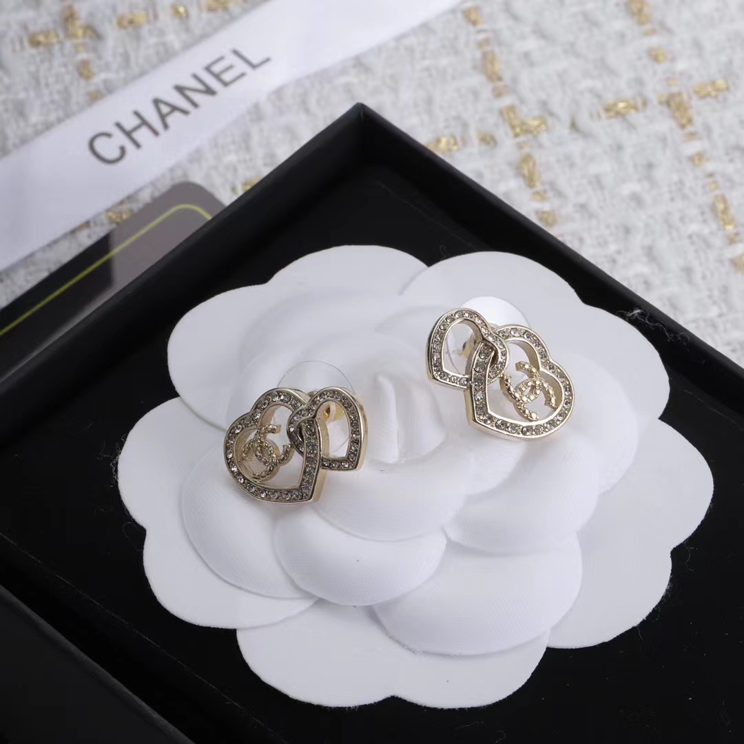 Buy replica Chanel Two Hollow Heart Stud Earrings and replica jewelry from PICKS Jewelry