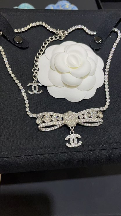 Buy replica Chanel Rhinestone Strass Bowknot Pendant Necklace and replica jewelry from PICKS Jewelry