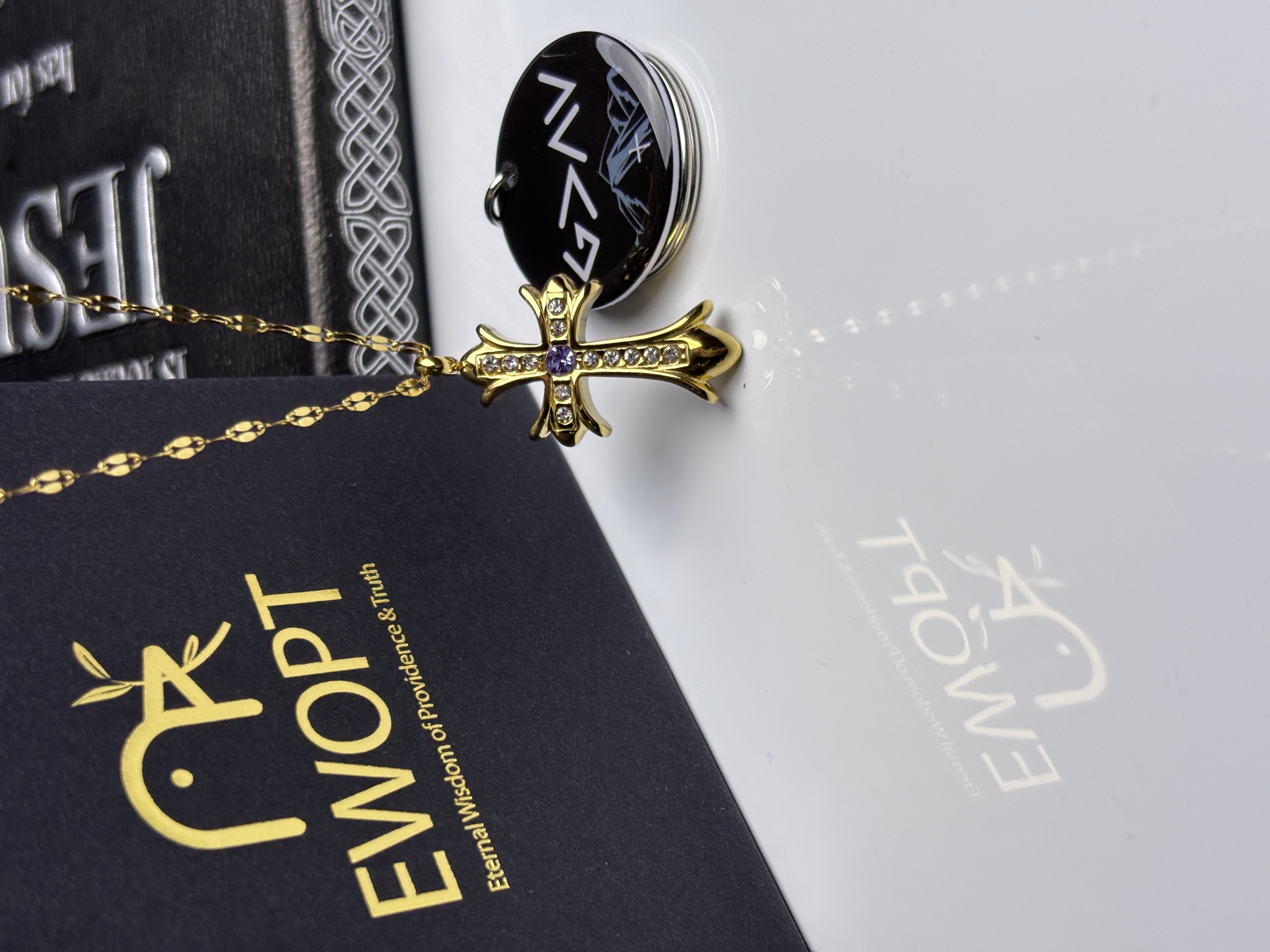 Chic gold cross necklace designed for the contemporary believer, complete with an NFC keychain for daily scripture readings.