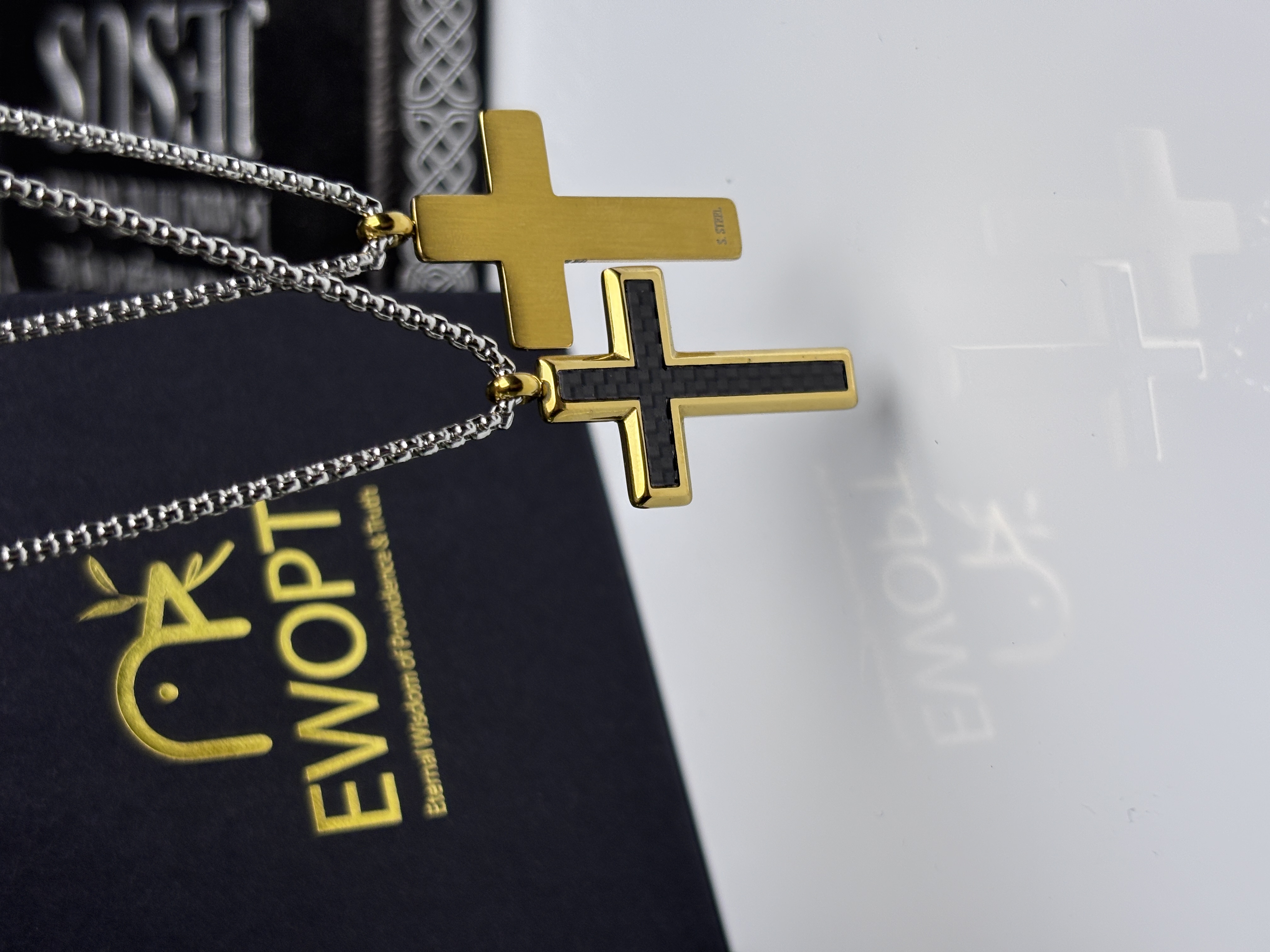 Modern spirituality meets classic style with this gold cross necklace, enhanced by a carbon fiber design and an NFC keychain that provides scripture readings, combining timeless elegance with contemporary technology.