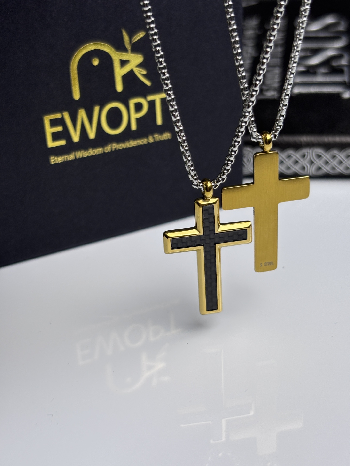 Modern spirituality meets classic style with this gold cross necklace, enhanced by a carbon fiber design and an NFC keychain that provides scripture readings, combining timeless elegance with contemporary technology.