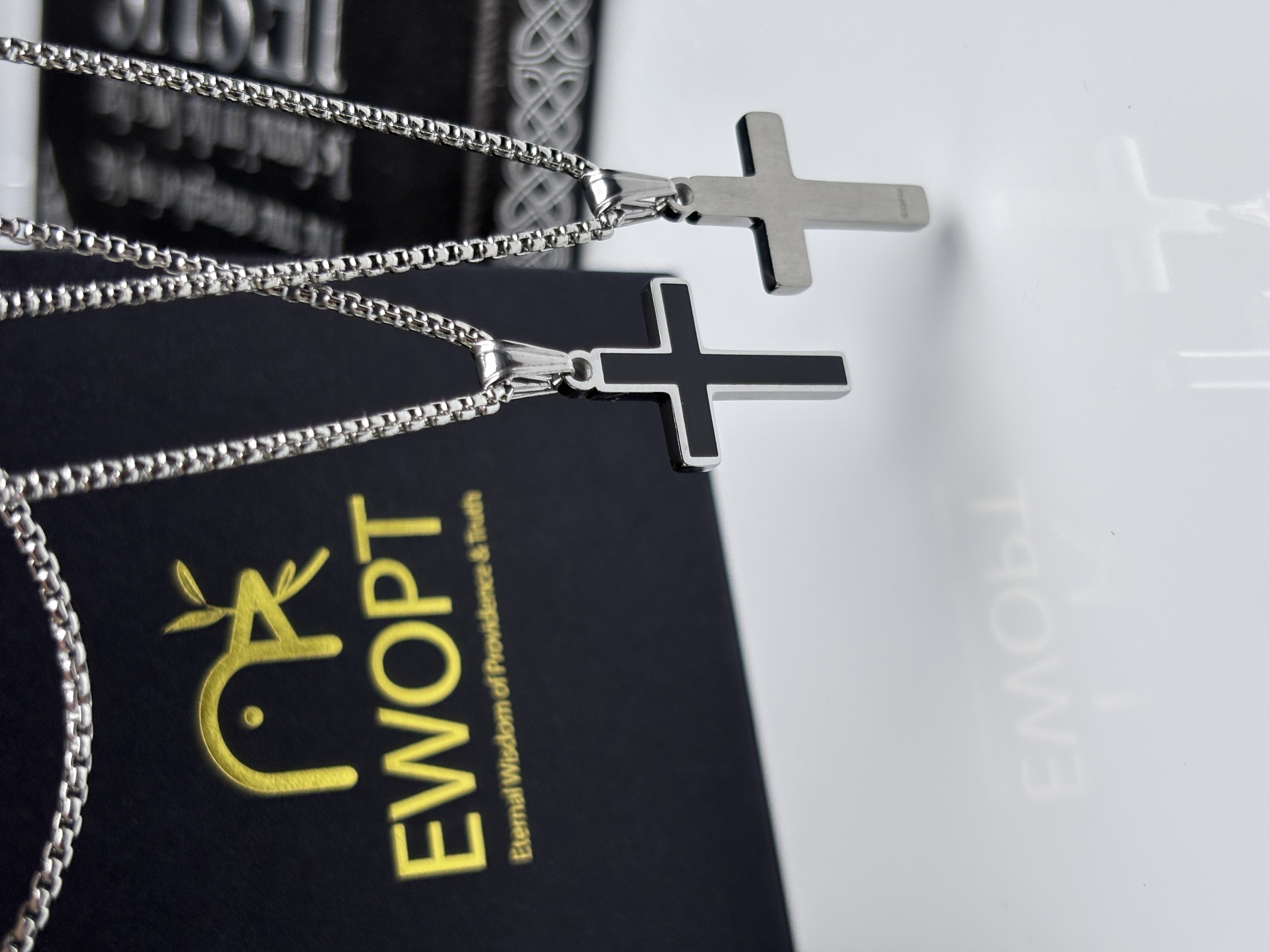 Silver-toned cross necklace with a modern NFC tag for instant scripture readings, combining fashion with daily spiritual engagement.