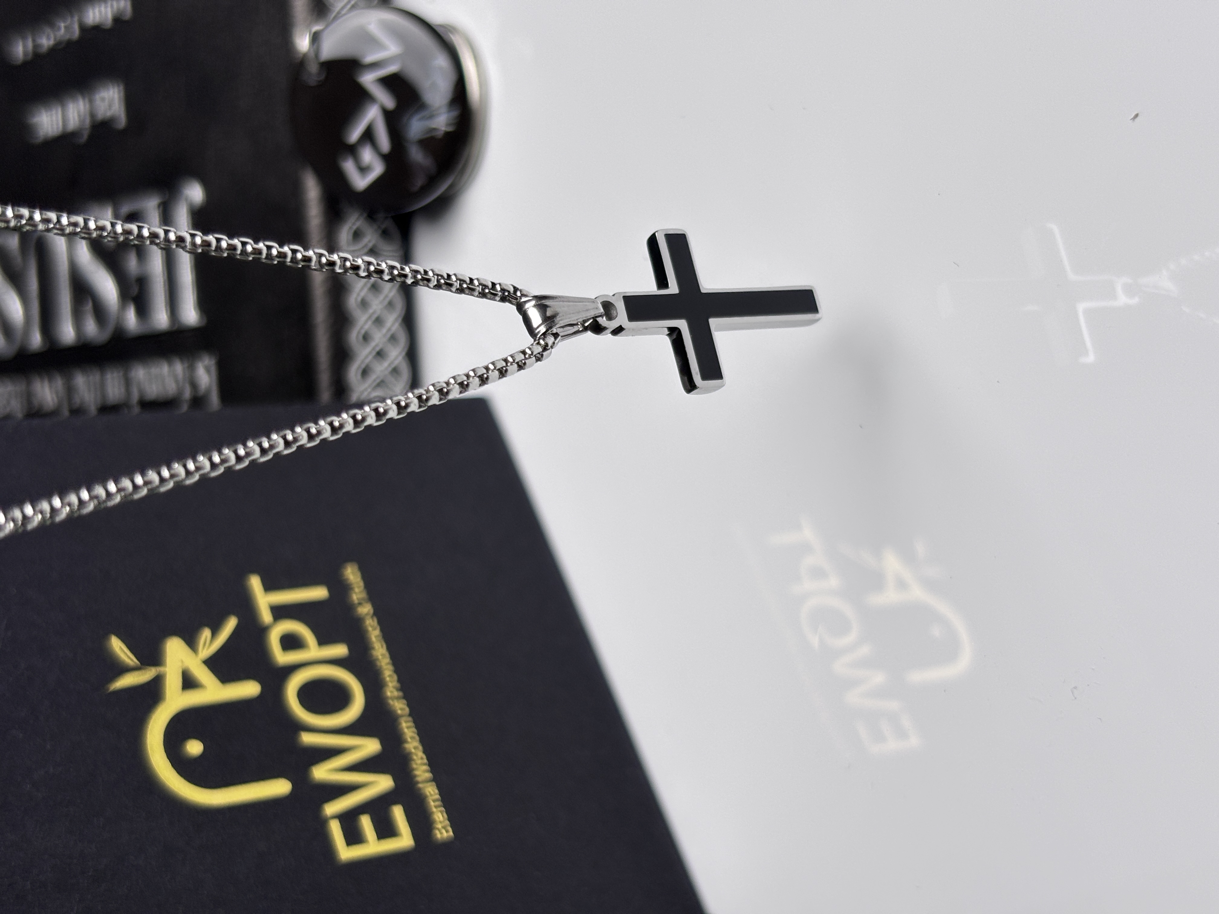 Sleek cross necklace offering seamless daily Bible verse access through an integrated NFC keychain, ideal for the tech-savvy believer.
