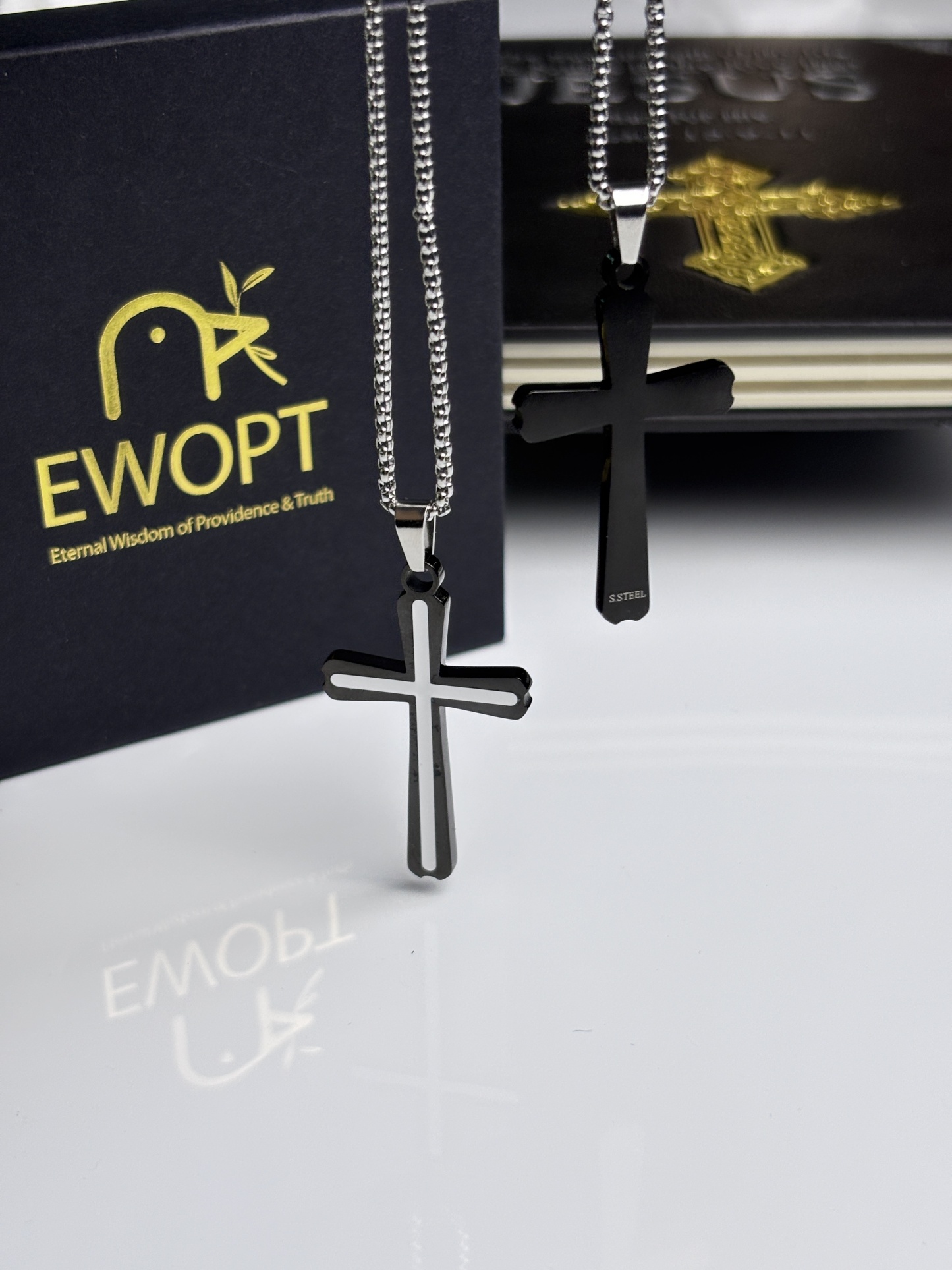 This elegant stainless steel cross necklace with a contrasting black carbon fiber inset captures the essence of modern faith, accompanied by a NFC-enabled keychain that provides daily Bible verses to inspire and guide.