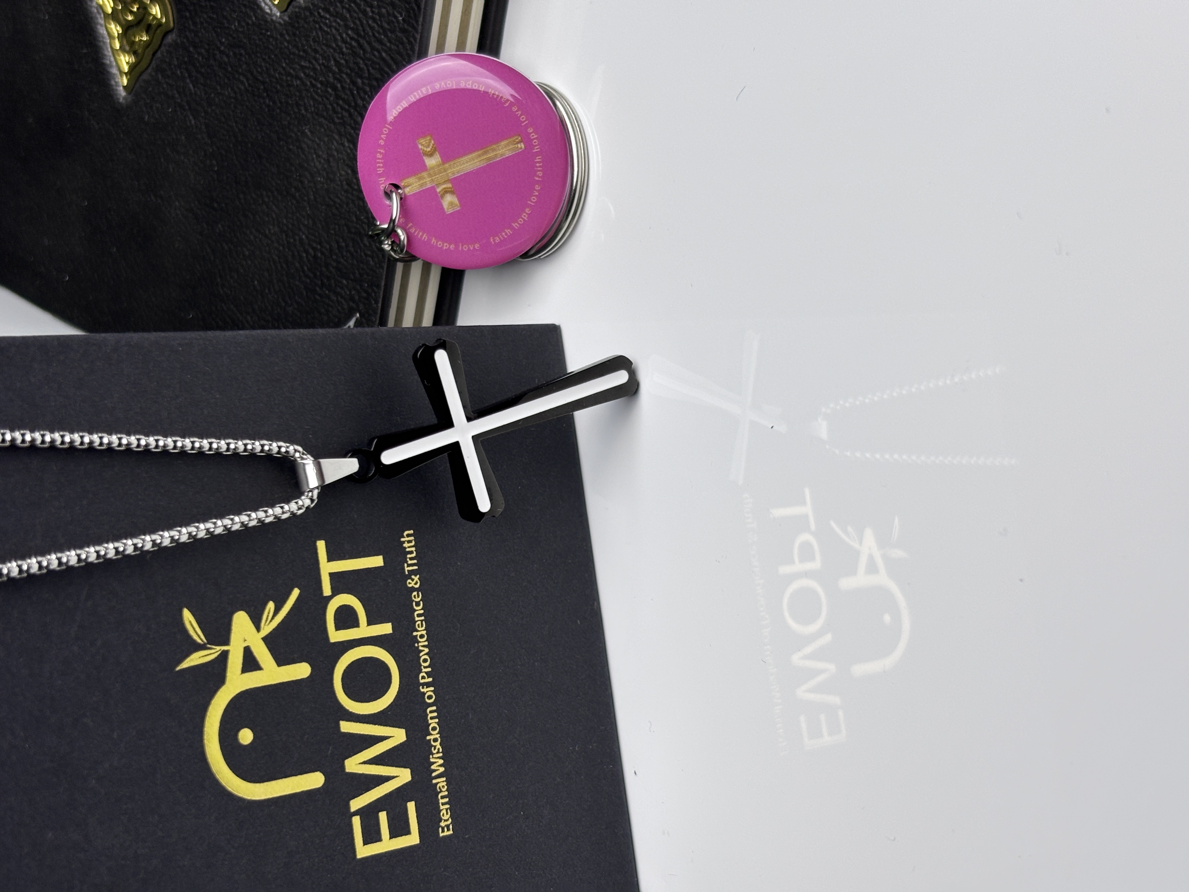 Crafted with precision, this stainless steel cross necklace with a unique carbon fiber inlay and an NFC keychain provides a daily connection to biblical scriptures, merging traditional symbols with contemporary technology.