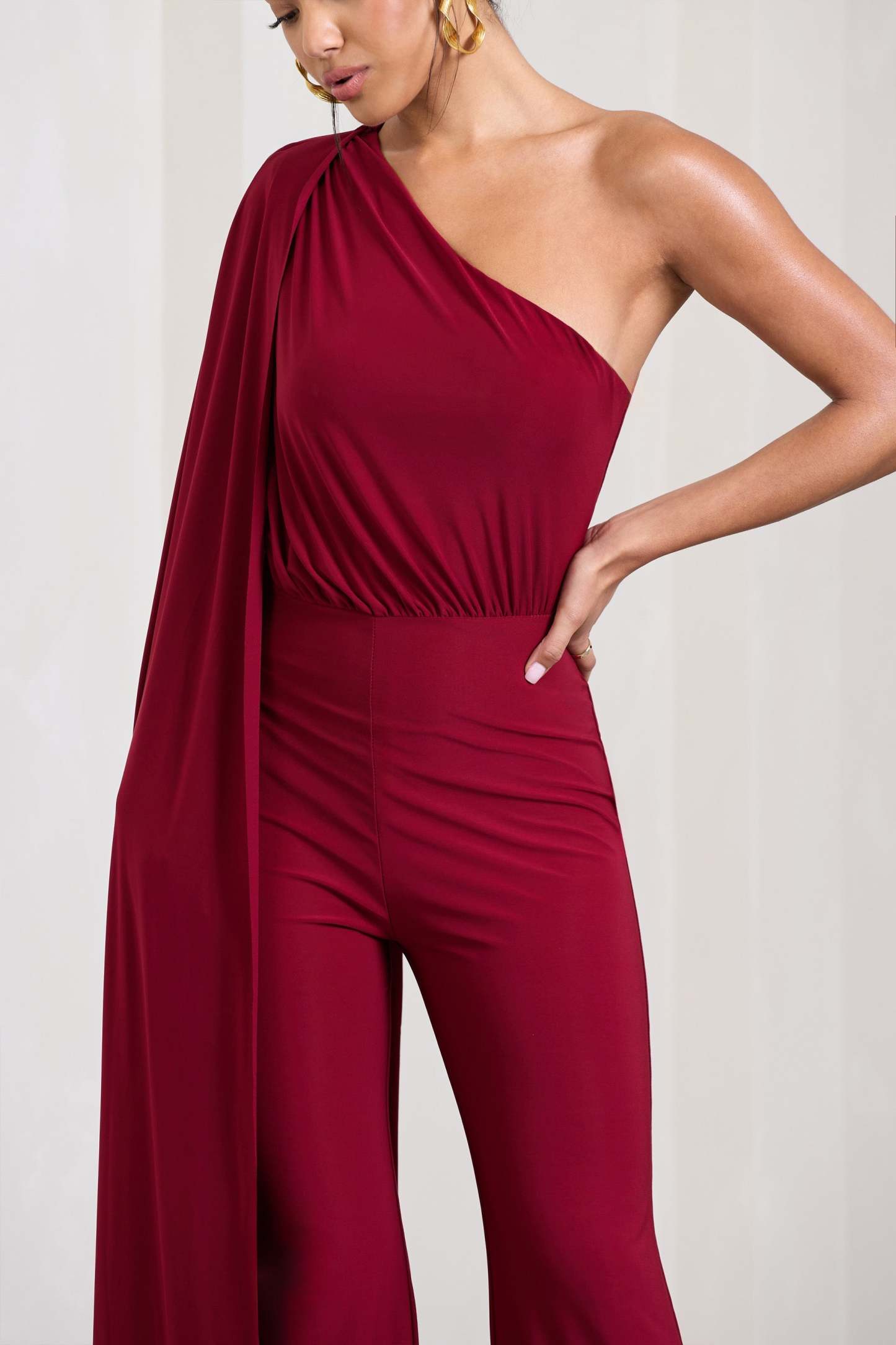 Aurora Berry One Shoulder Cape Sleeve Jumpsuit-Fashionmomo.All Rights Reserved