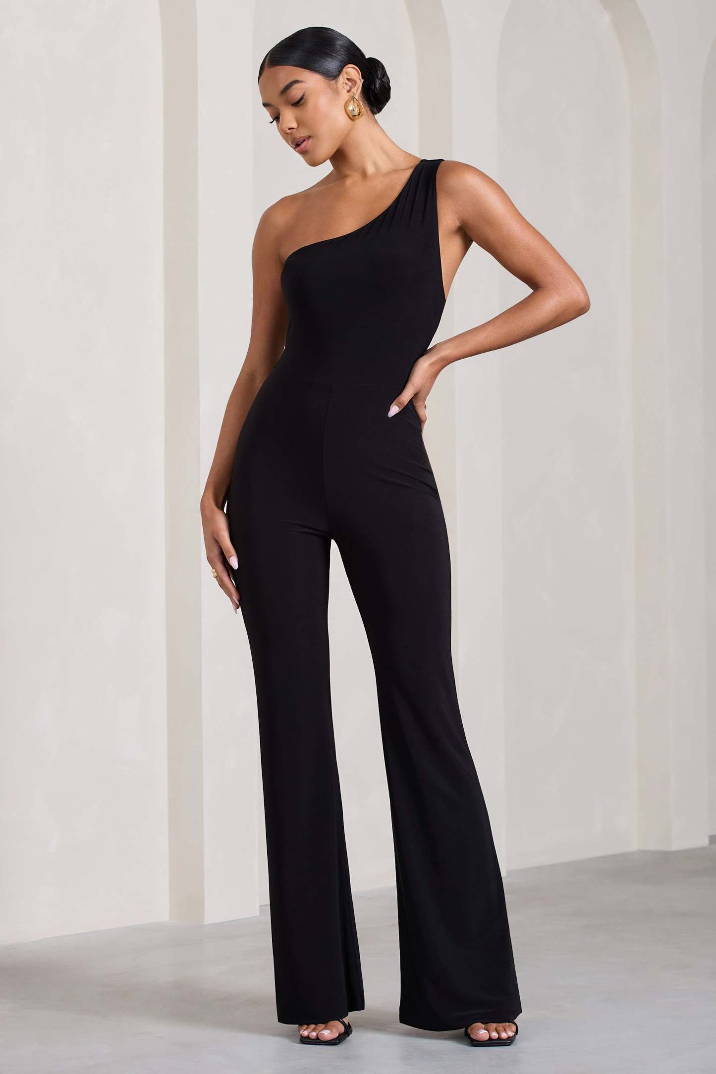 In The Dark Black Sleeveless Asymmetric Flared-Leg Jumpsuit-Fashionmomo.All Rights Reserved