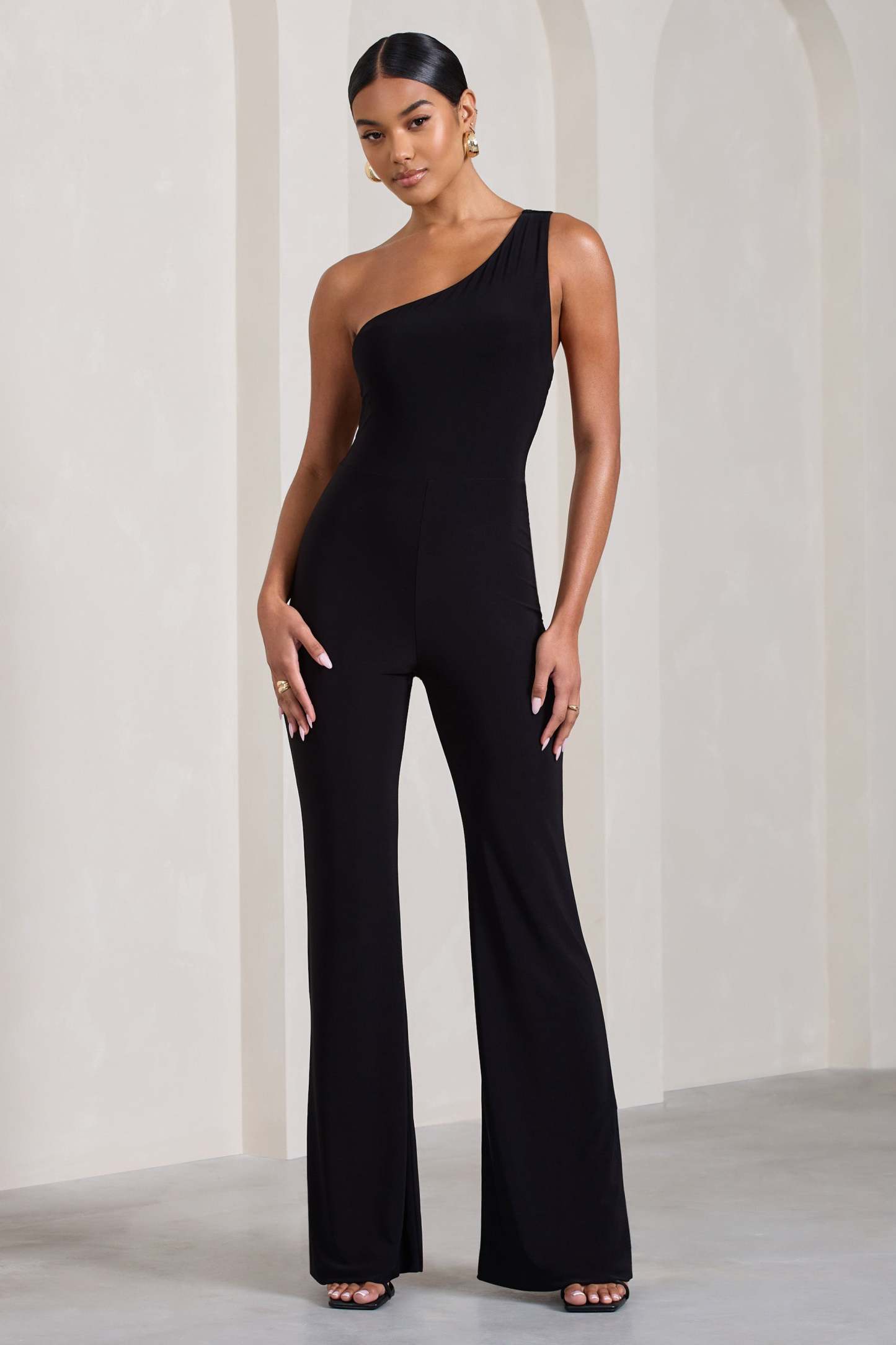 In The Dark Black Sleeveless Asymmetric Flared-Leg Jumpsuit-Fashionmomo.All Rights Reserved
