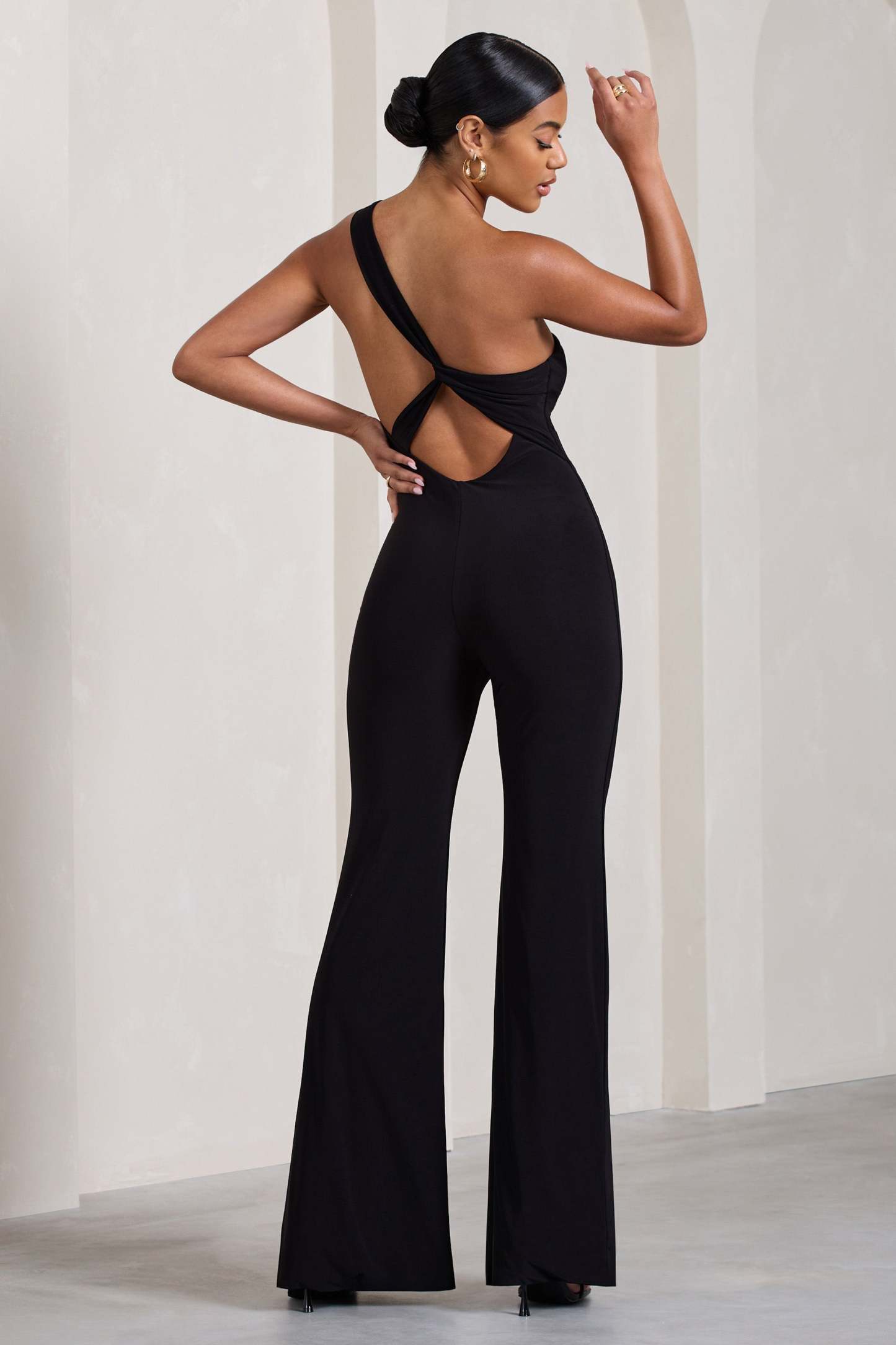 In The Dark Black Sleeveless Asymmetric Flared-Leg Jumpsuit-Fashionmomo.All Rights Reserved