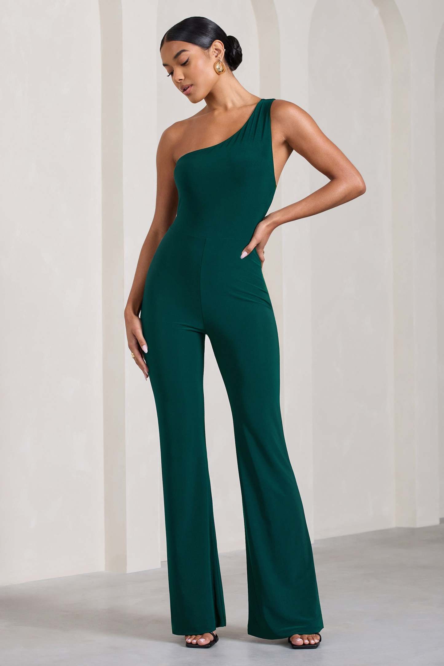 In The Dark Bottle Green Sleeveless Asymmetric Flared-Leg Jumpsuit-Fashionmomo.All Rights Reserved