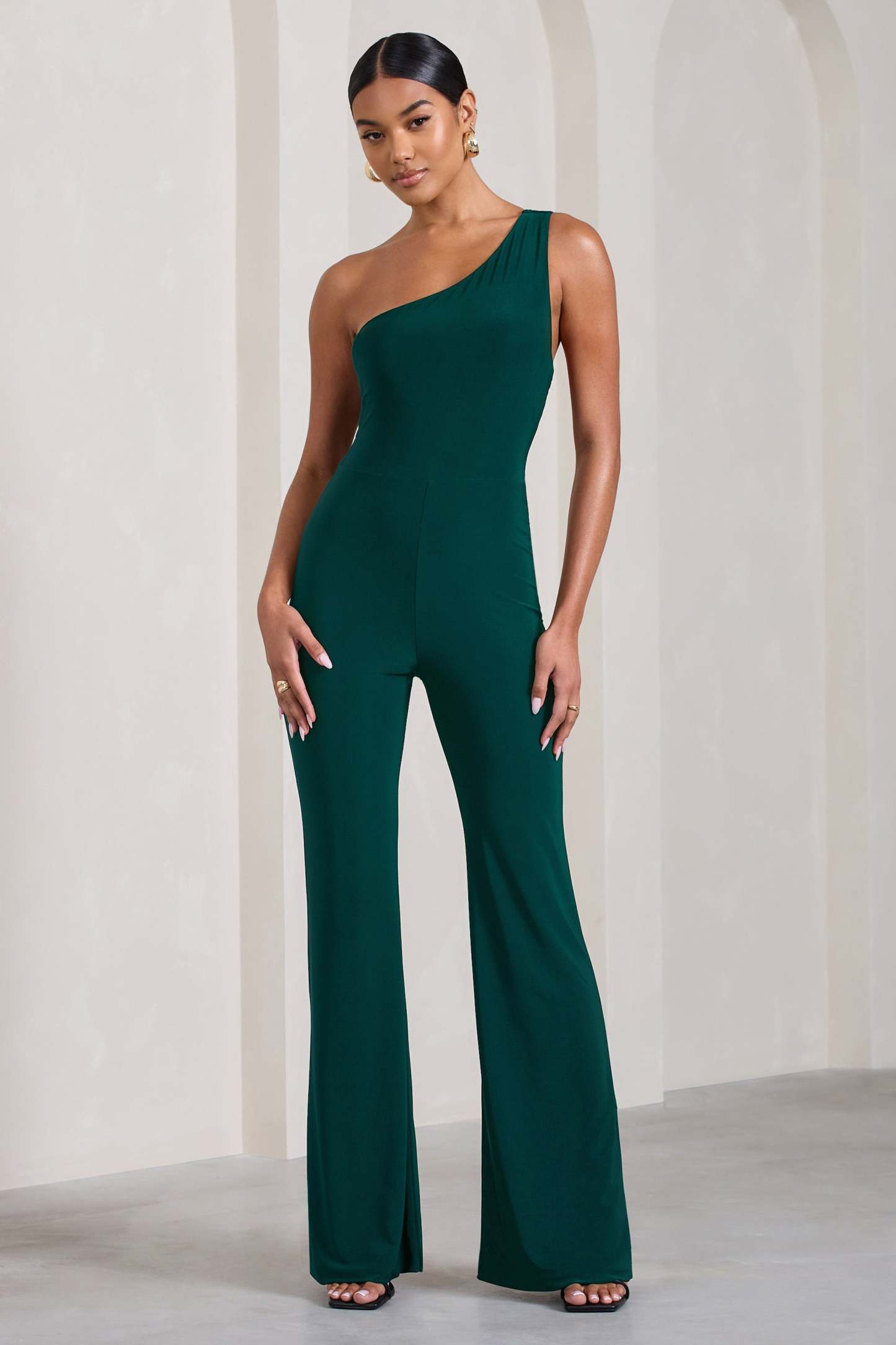In The Dark Bottle Green Sleeveless Asymmetric Flared-Leg Jumpsuit-Fashionmomo.All Rights Reserved