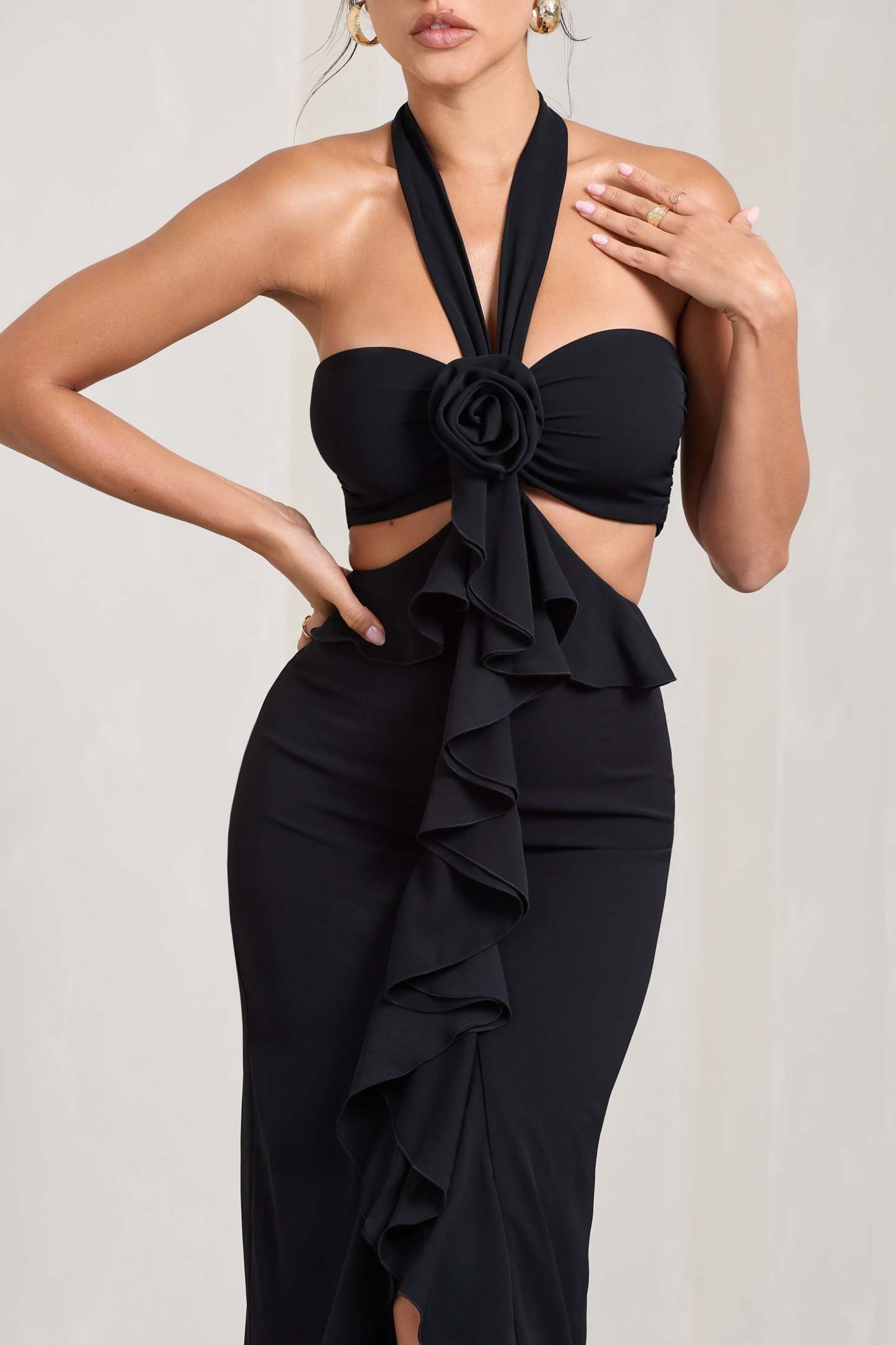 Powerful Black Cut-Out Halter-Neck Maxi Dress With Flower & Ruffles-Fashionmomo.All Rights Reserved
