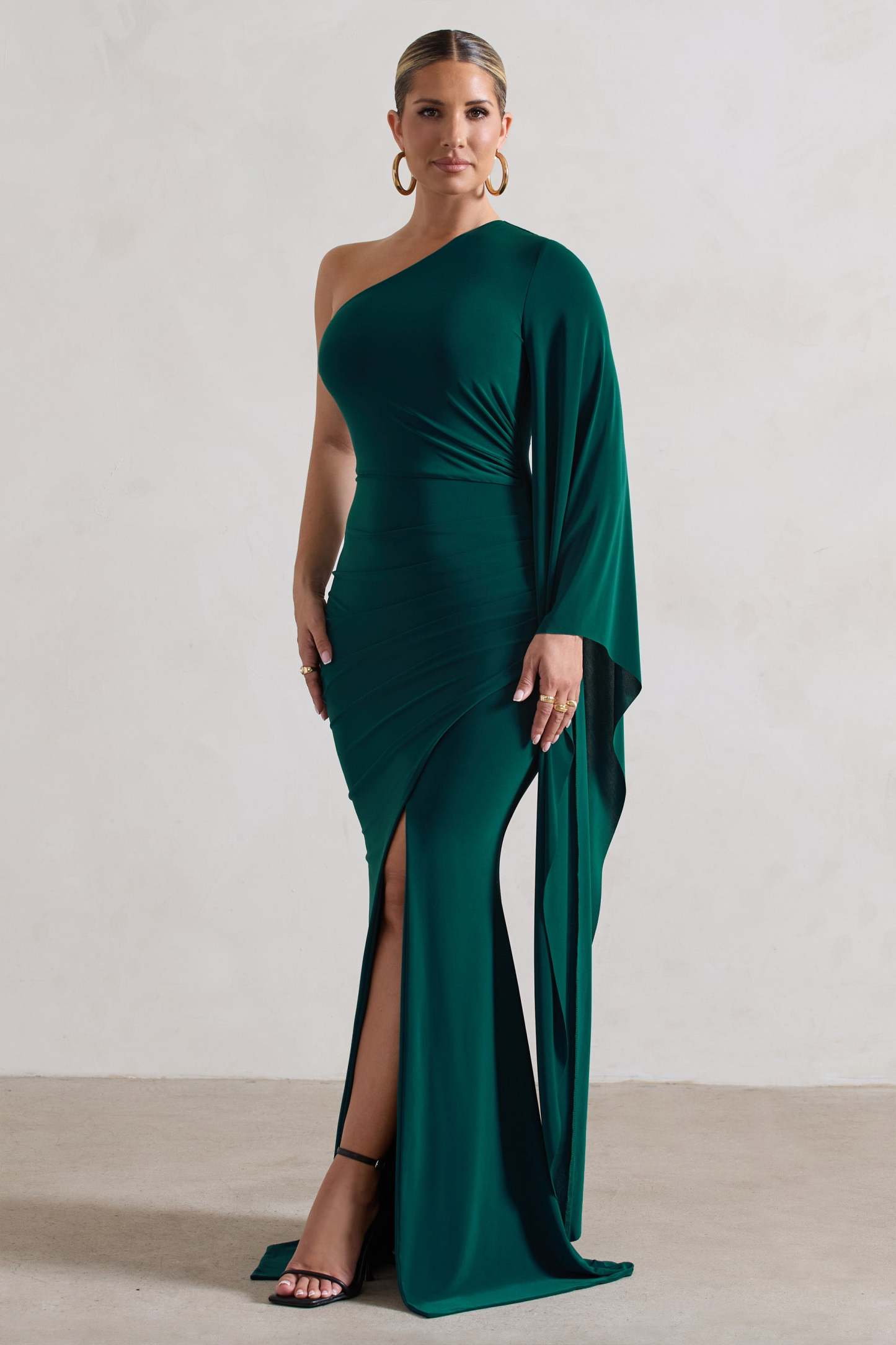 Giada Bottle Green Ruched Asymmetric Maxi Dress With Cape Sleeve-Fashionmomo.All Rights Reserved