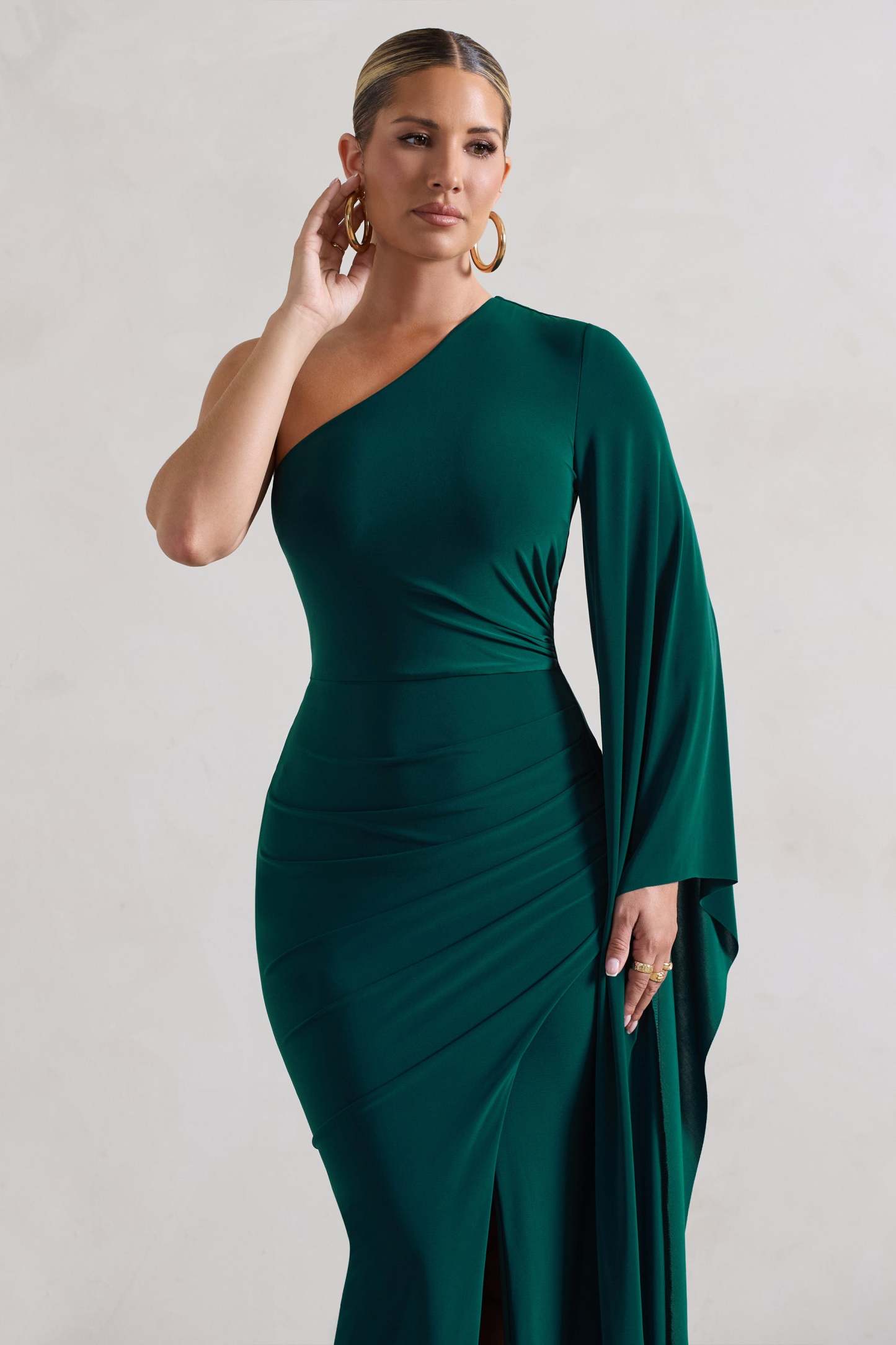 Giada Bottle Green Ruched Asymmetric Maxi Dress With Cape Sleeve-Fashionmomo.All Rights Reserved