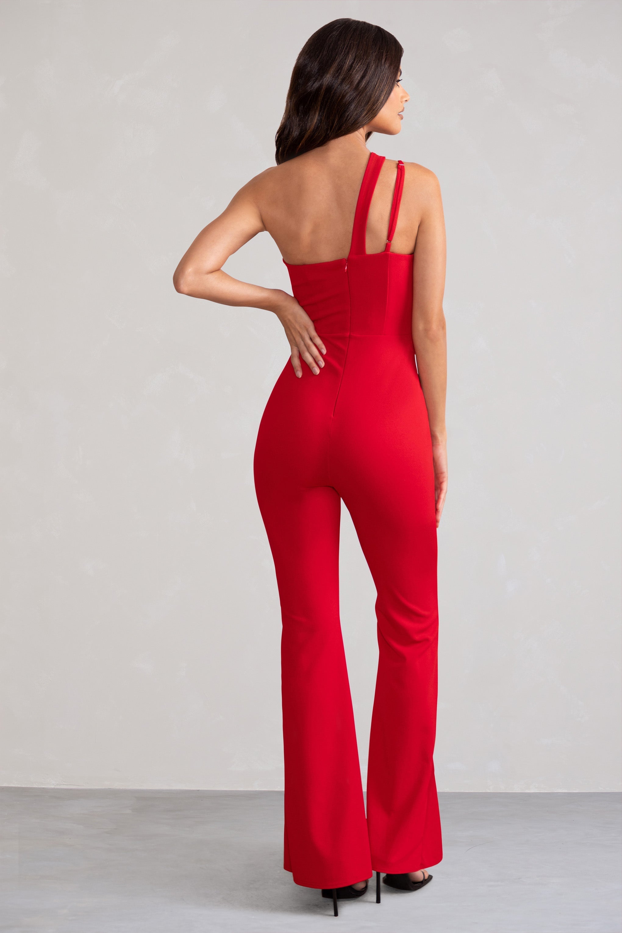 Bold Confidence Red One Shoulder Cut Out Flare Jumpsuit-Fashionmomo.All Rights Reserved
