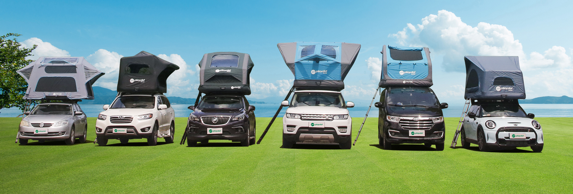 Six vehicles equipped with PlayDo inflatable rooftop tents, displayed outdoors by the lake