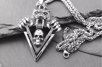 Sabretooth tiger, skull necklace
