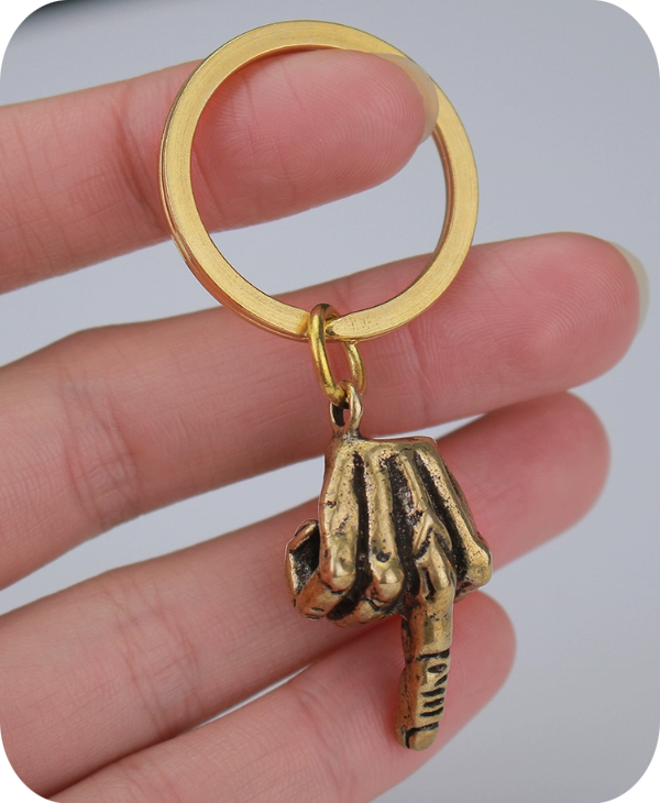 Brass skull helmet bell charm