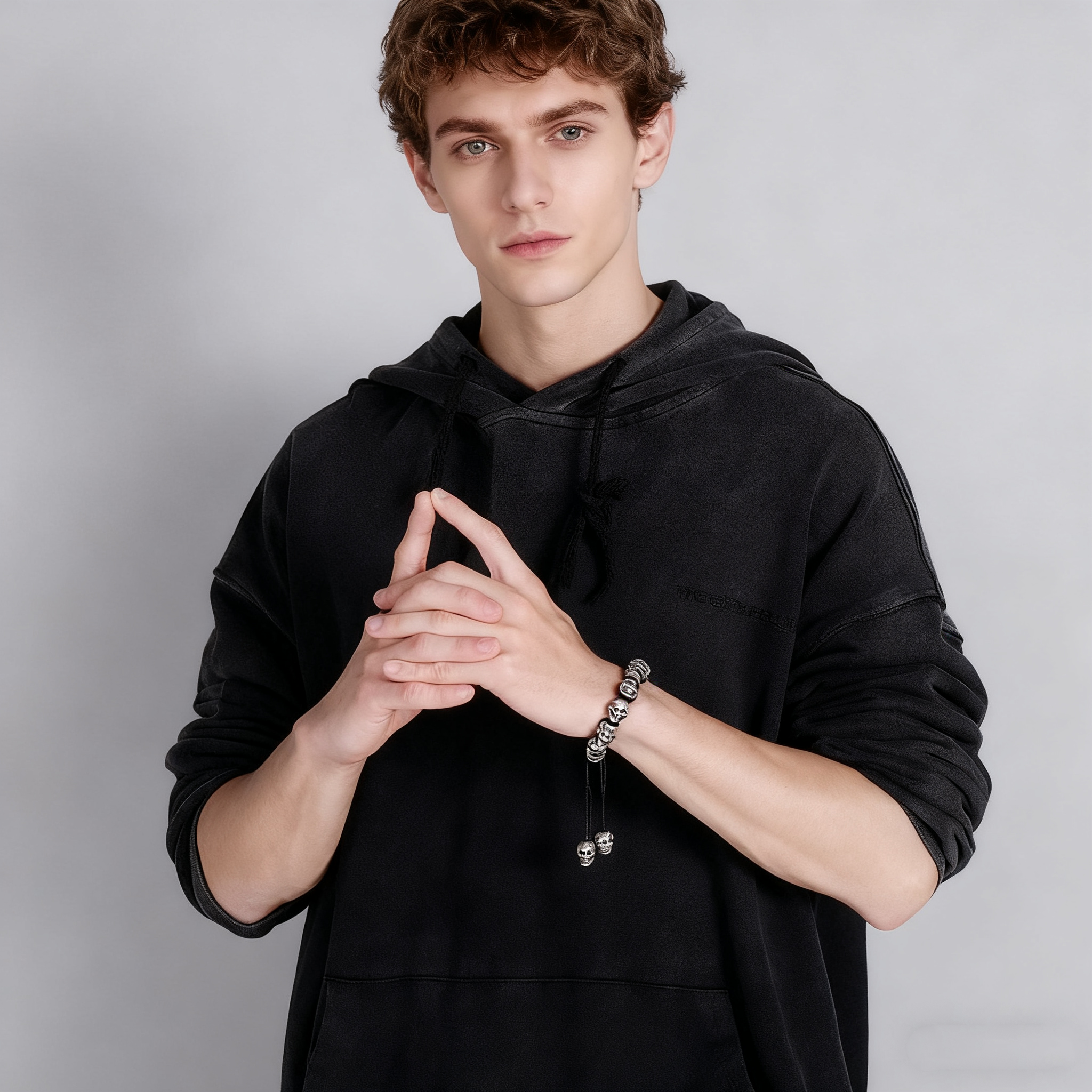 Hand-woven sterling silver skull bracelet