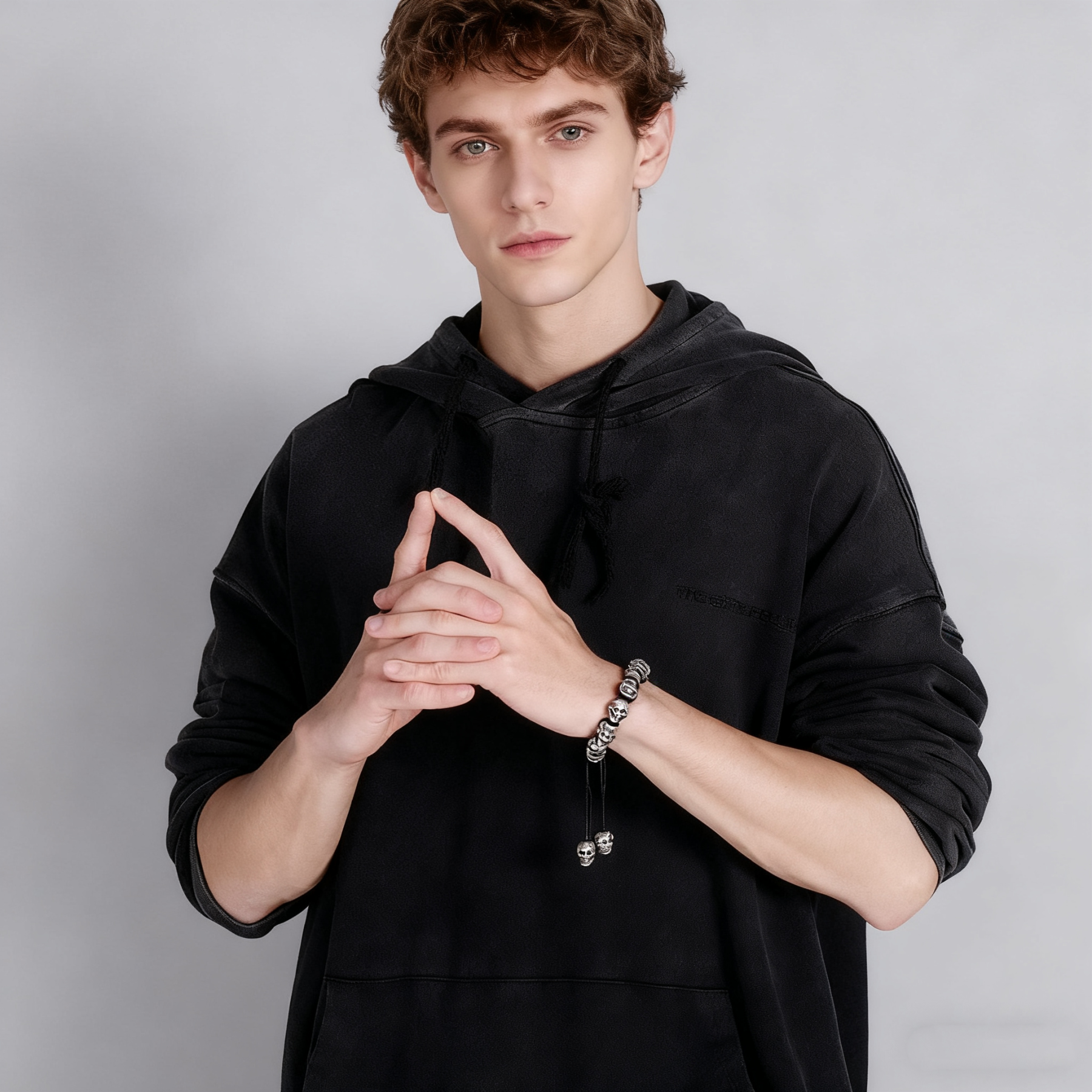 Hand-woven sterling silver skull bracelet