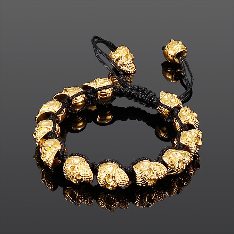 Hand-woven sterling silver skull bracelet