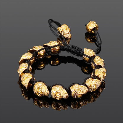 Hand-woven sterling silver skull bracelet