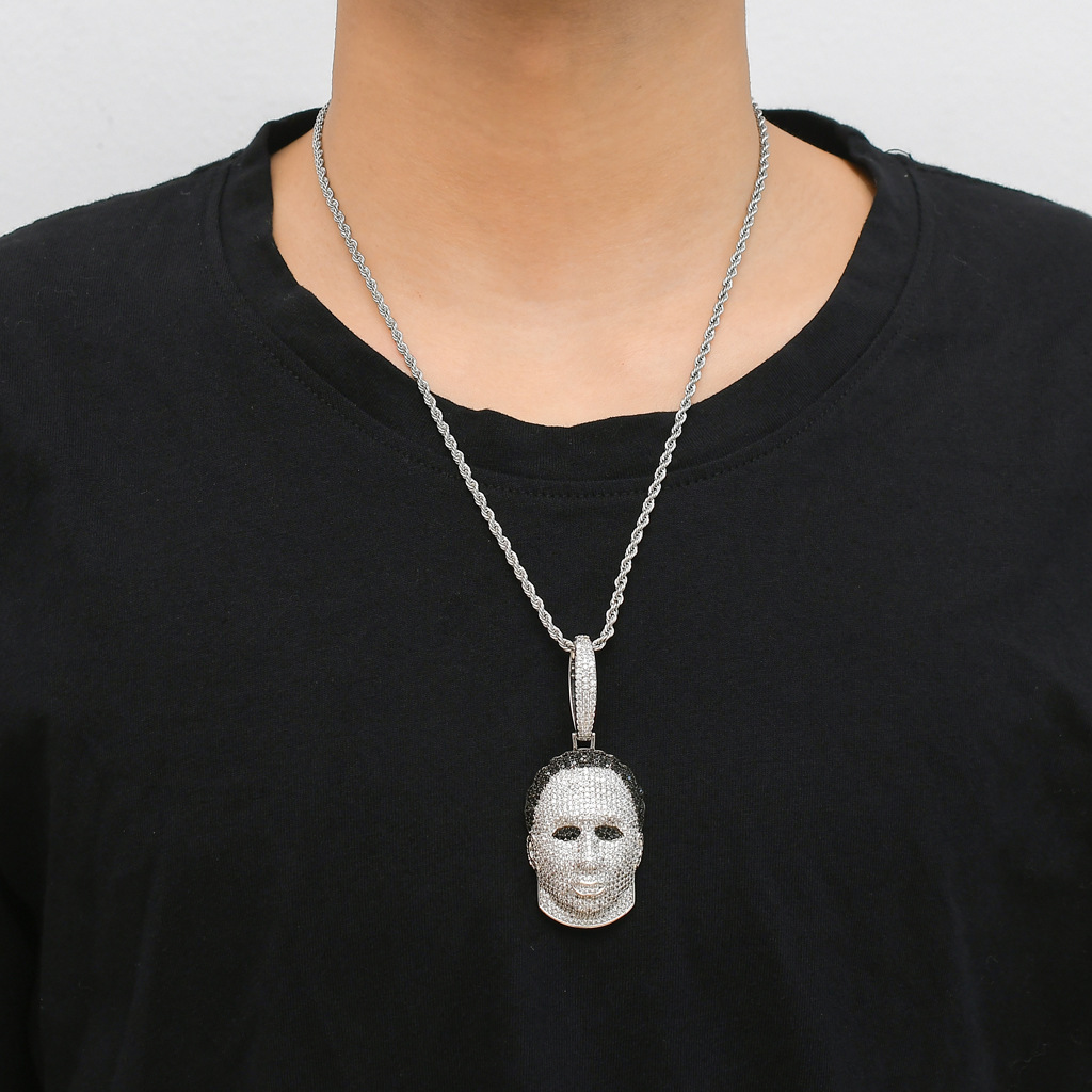 Human head mask necklace