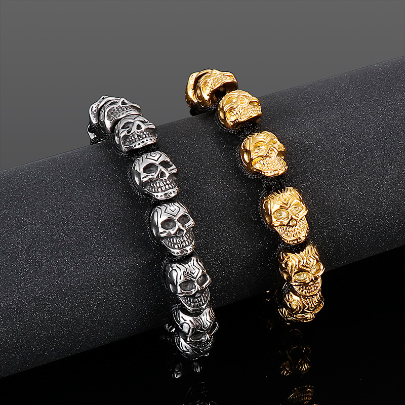 Hand-woven sterling silver skull bracelet