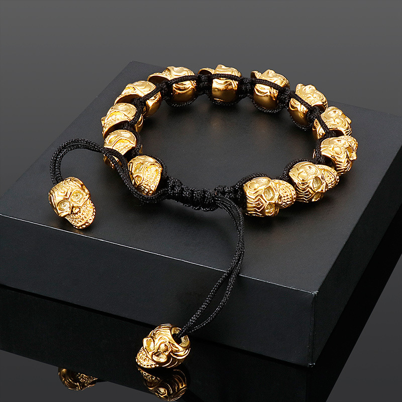 Hand-woven sterling silver skull bracelet