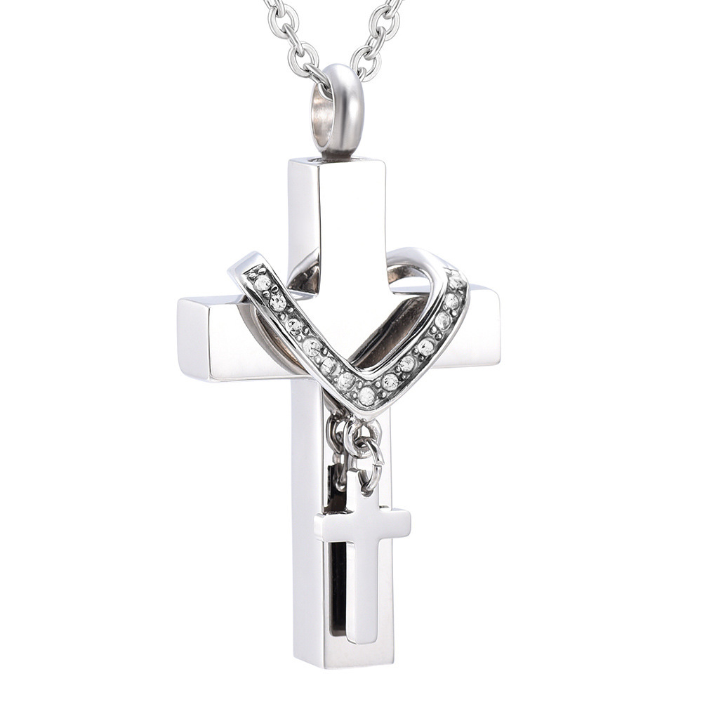 Cross necklace (can hold ashes/perfume)