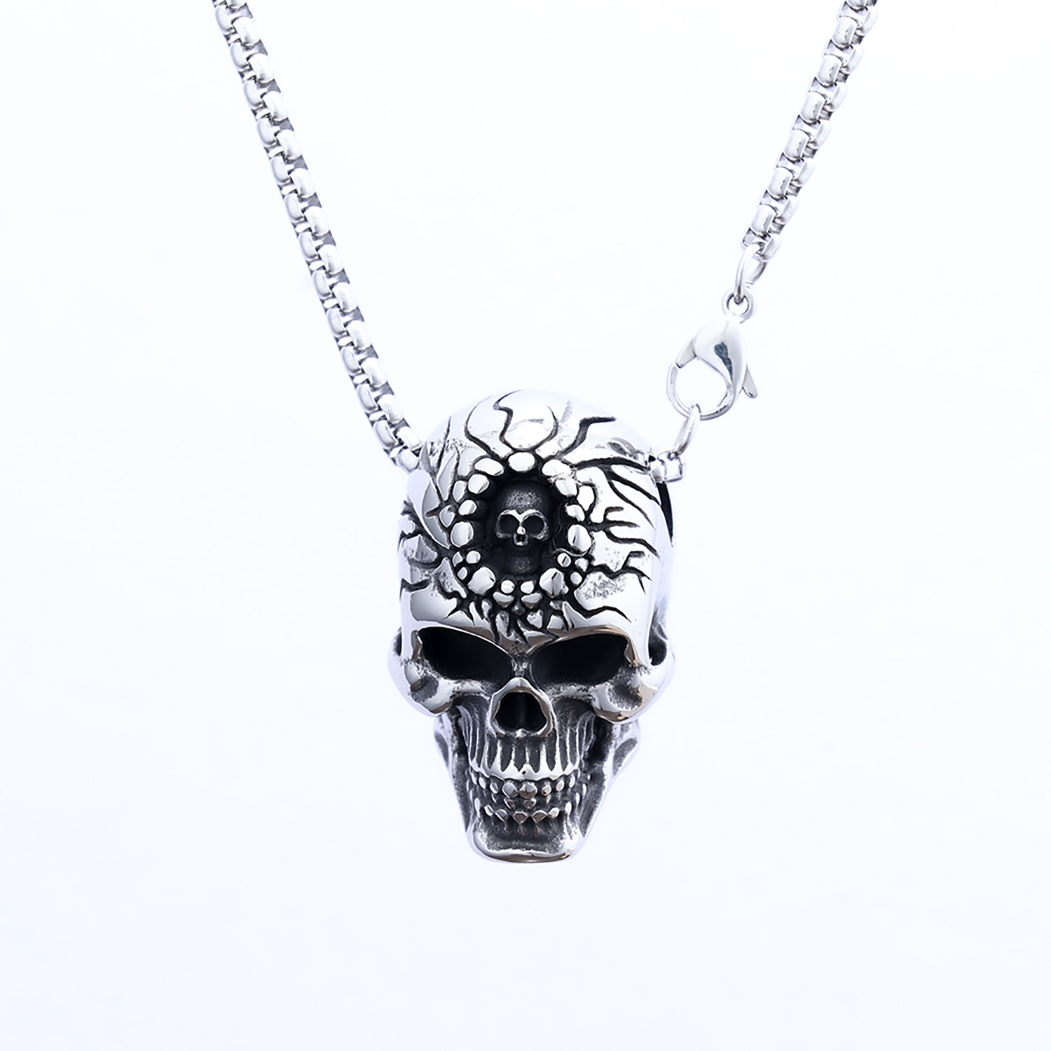 Large and small skull necklace