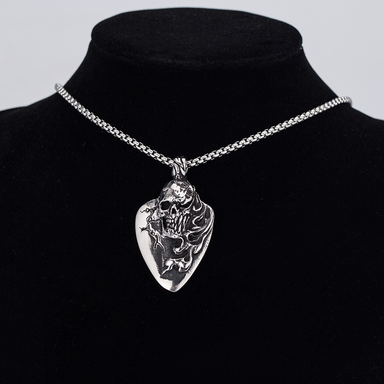 Guitar String Skull Necklace