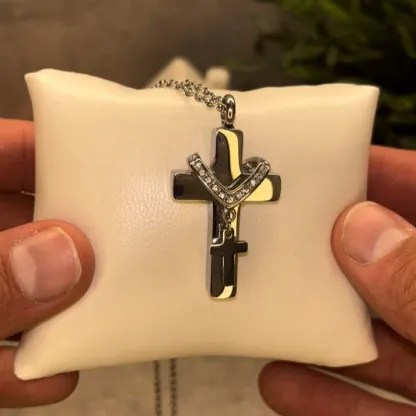 Cross necklace (can hold ashes/perfume)