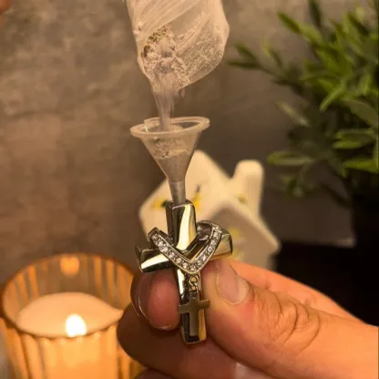 Cross necklace (can hold ashes/perfume)