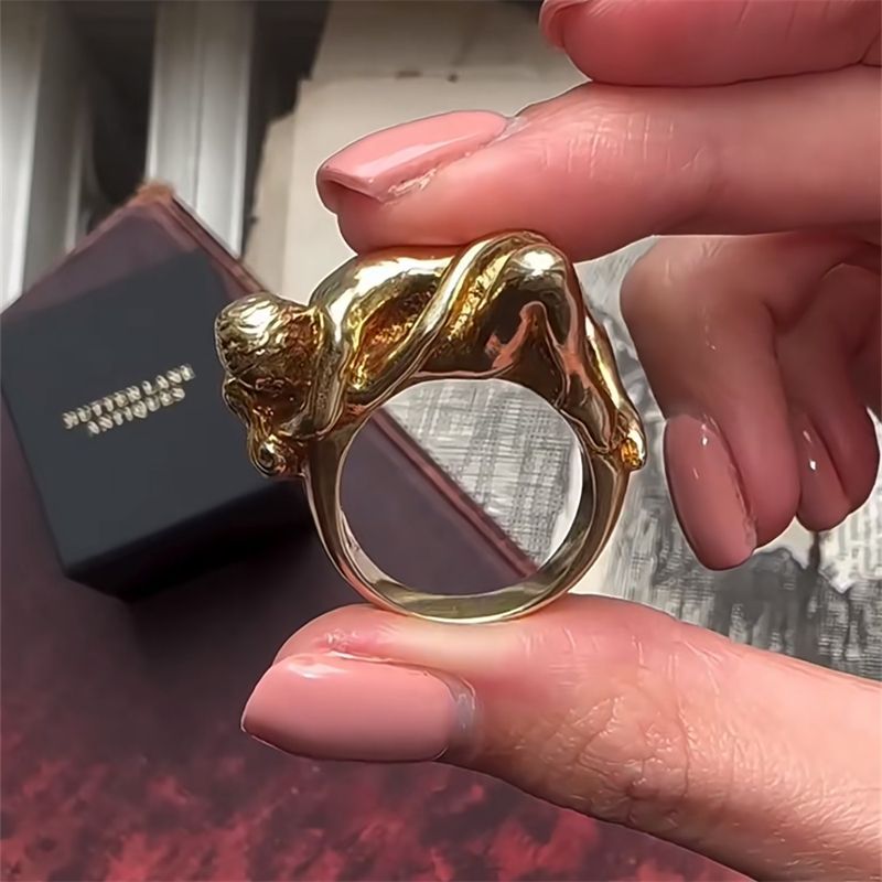 "Couple in Action" Ring