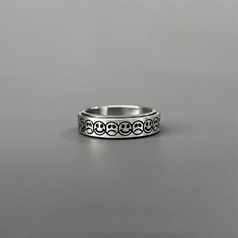 Rotatable smiley face ring