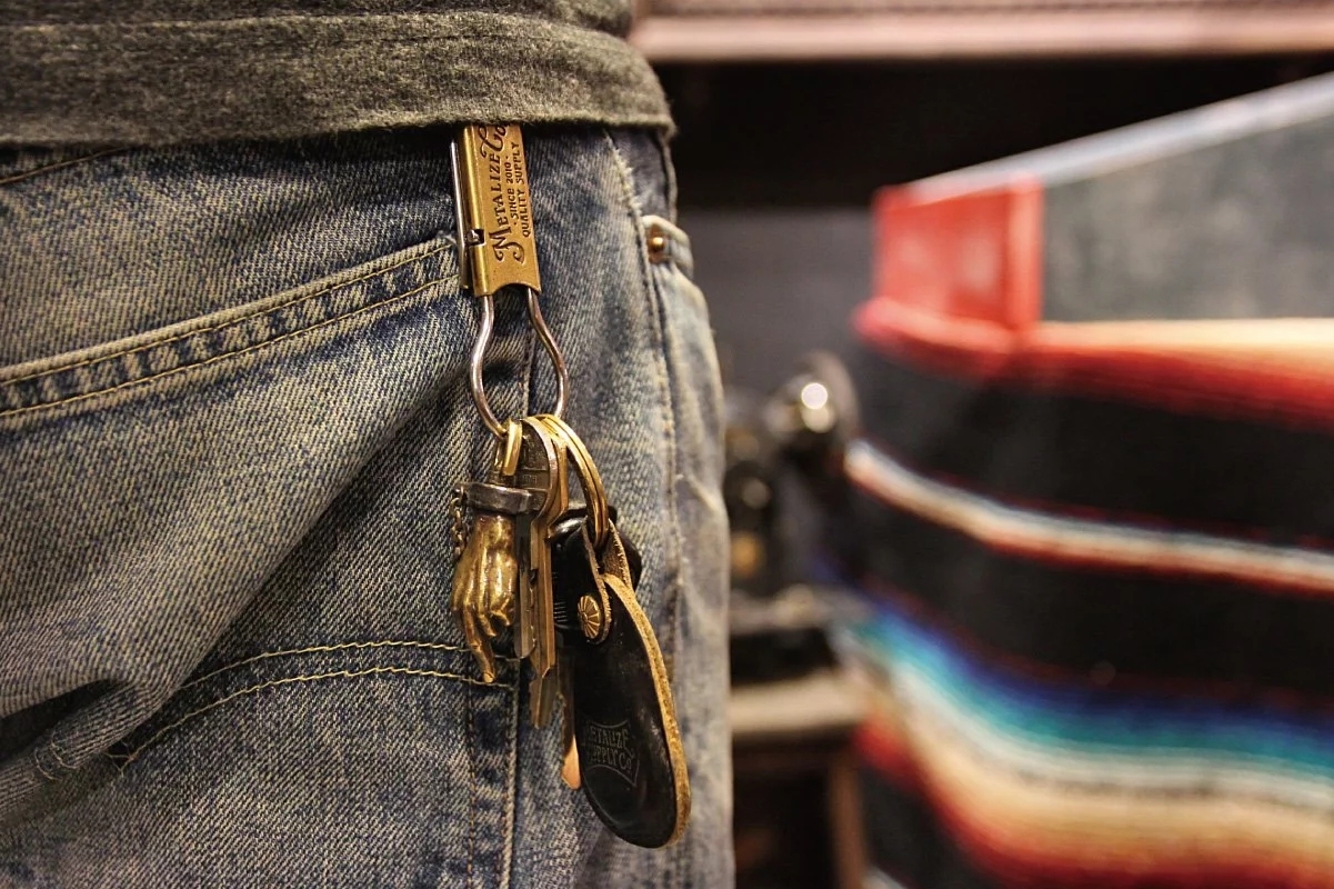 Brass skull helmet bell charm