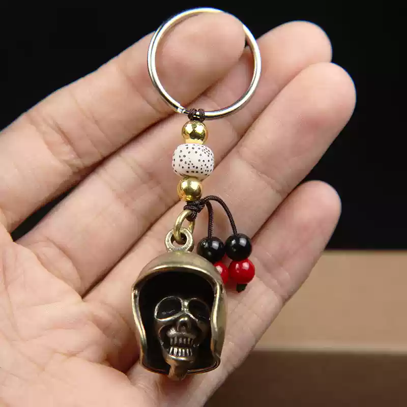 Brass skull helmet bell charm