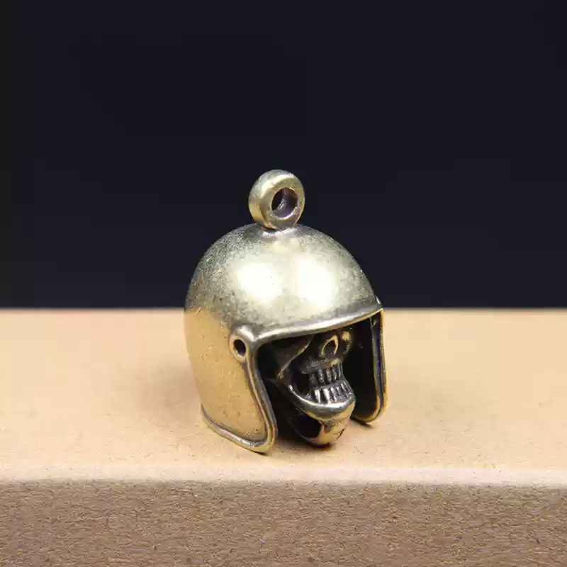 Brass skull helmet bell charm