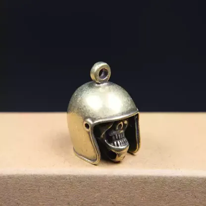 Brass skull helmet bell charm