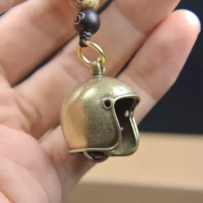 Brass skull helmet bell charm
