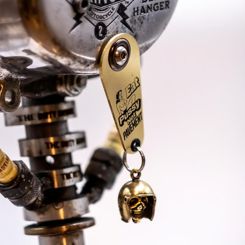 Brass skull helmet bell charm