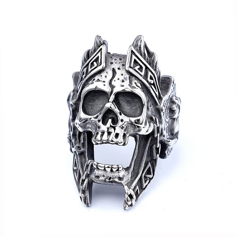 Domineering skull carved ring