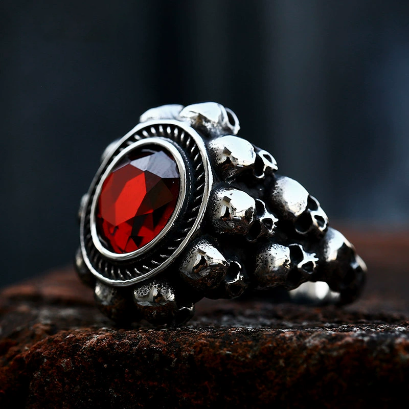 Red round gemstone skull ring