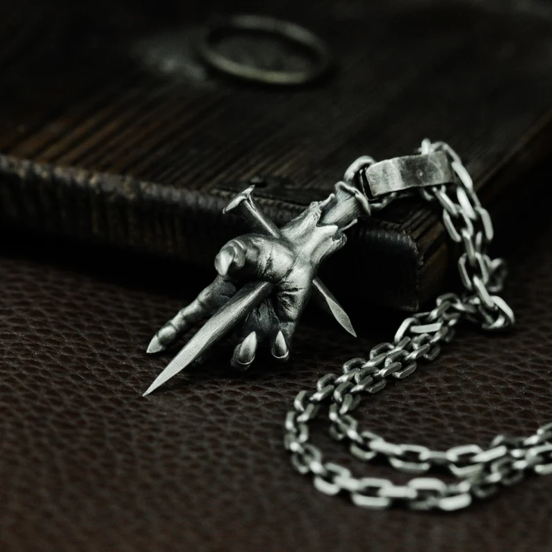 Devil's Hand Nail Cross Pendant