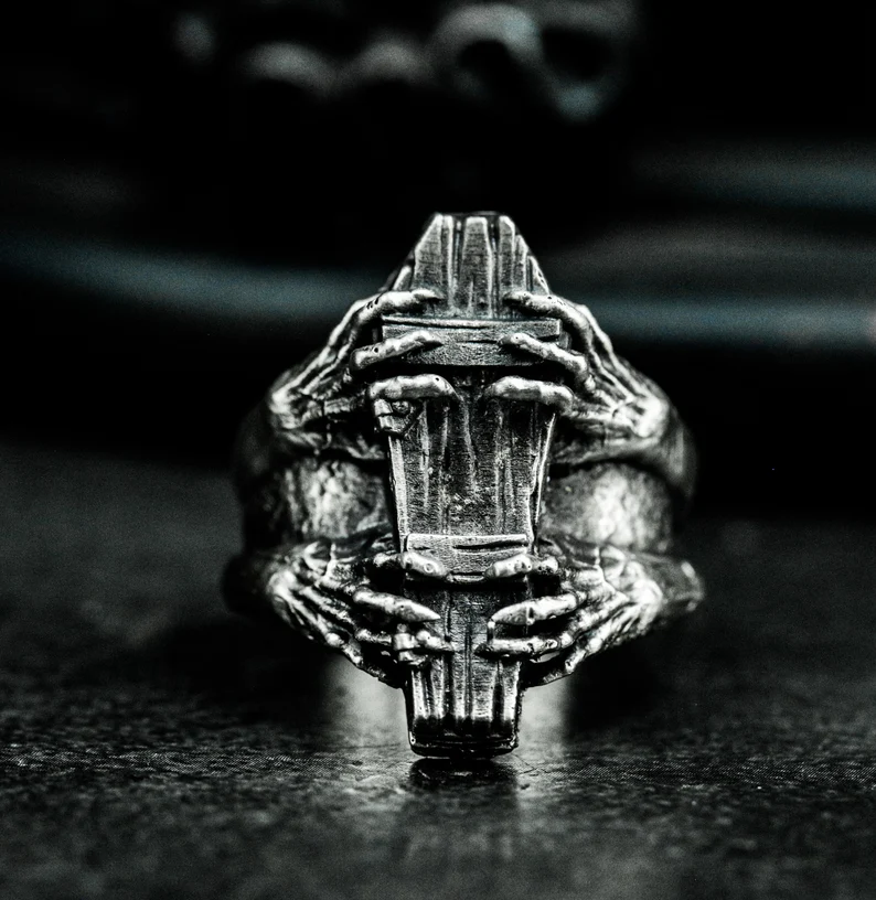 Old coffin skull finger ring