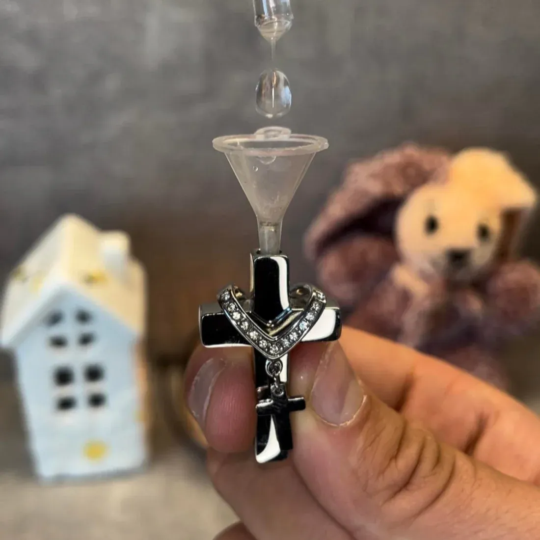 Cross necklace (can hold ashes/perfume)